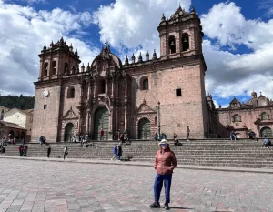 Historic plaza and cathedral scene in Cusco, Peru during a city tour