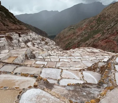 Photo of the Maras Salt Mines in Peru showing terraced salt ponds used for traditional salt harvesting.